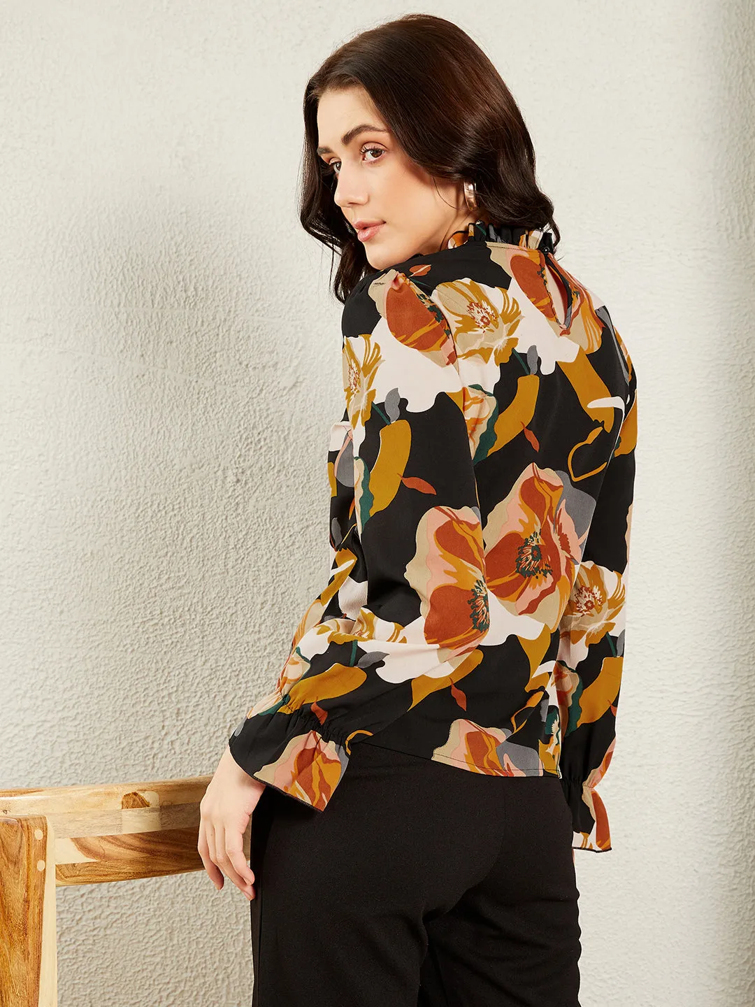 Berrylush BIZwear Women Black & Orange Floral Printed High-Neck Bishop Sleeve Ruffled Regular Top