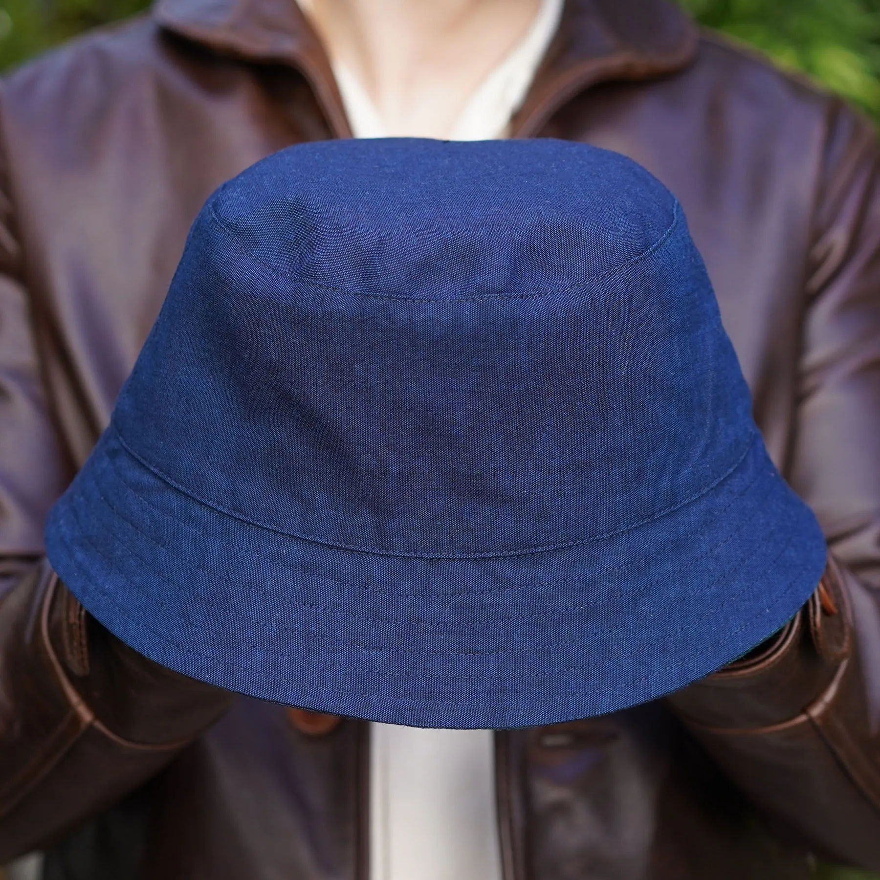 Joyride Reversible Bucket Hat in E. Thomas Black Watch Plaid Wool/Orta Anadolu Deep Indigo Chambray