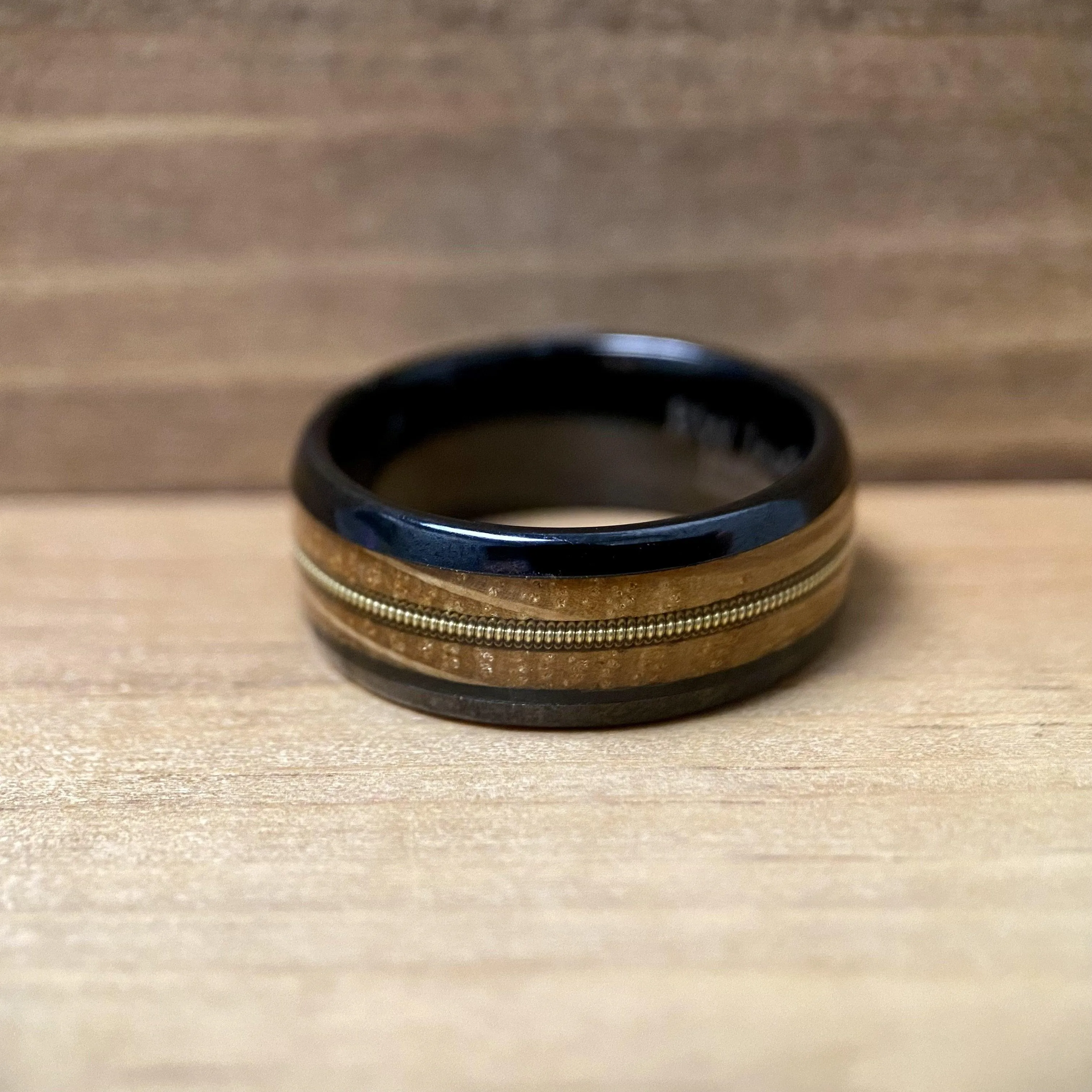 “The Bluegrass Guitar Player”  Kentucky Bourbon Whiskey Barrel Black Ceramic Ring With Guitar String