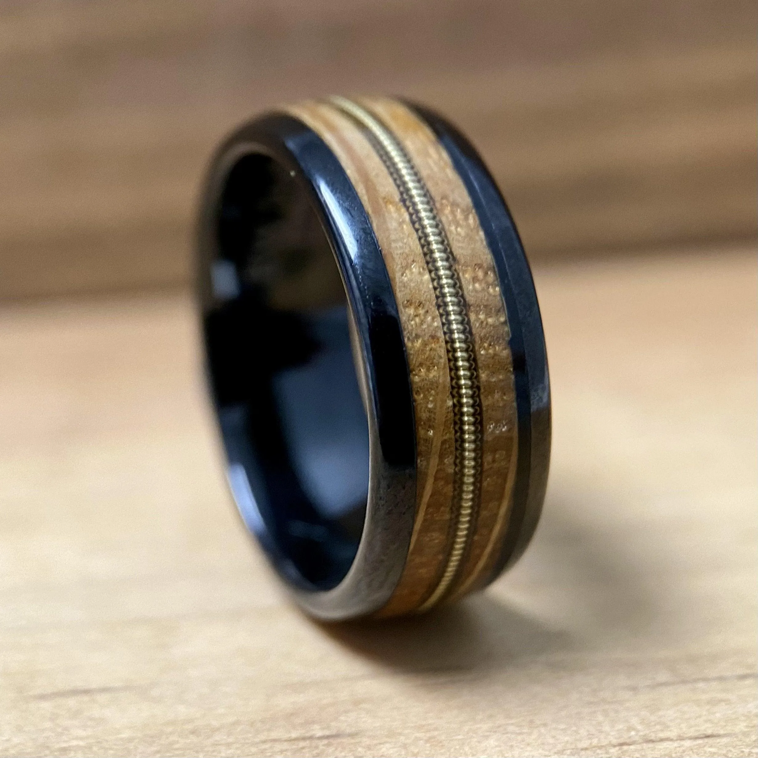 “The Bluegrass Guitar Player”  Kentucky Bourbon Whiskey Barrel Black Ceramic Ring With Guitar String